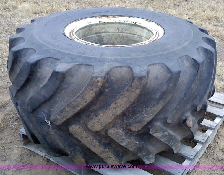 image for item 1828 (2) Goodyear 48x25.00-20NHS Terra tires and rims