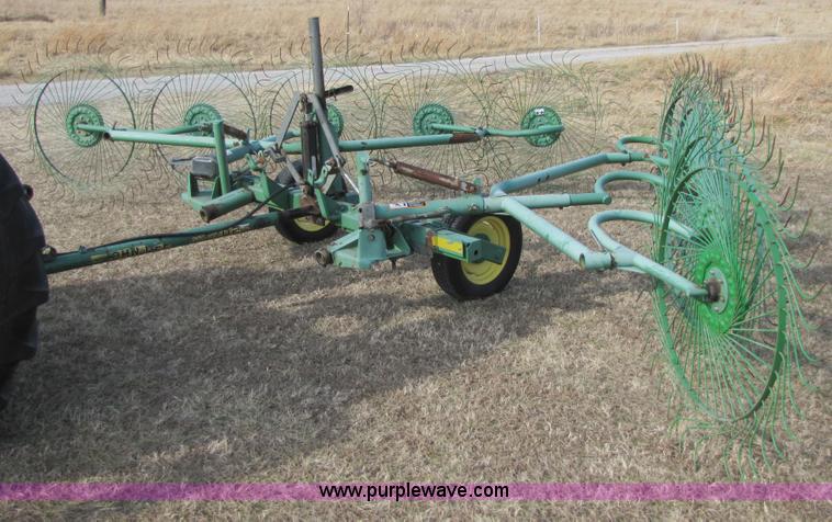 image for item 3515 John Deere 702 10 wheel rake