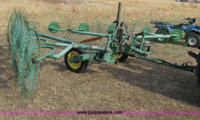 image for item 3515 John Deere 702 10 wheel rake