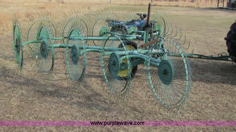 image for item 3515 John Deere 702 10 wheel rake