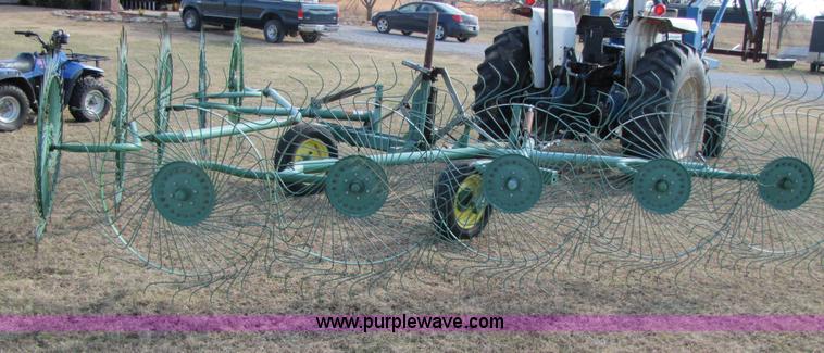 image for item 3515 John Deere 702 10 wheel rake