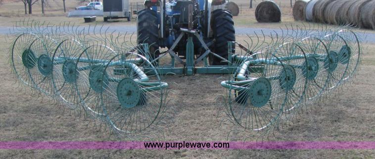 image for item 3515 John Deere 702 10 wheel rake