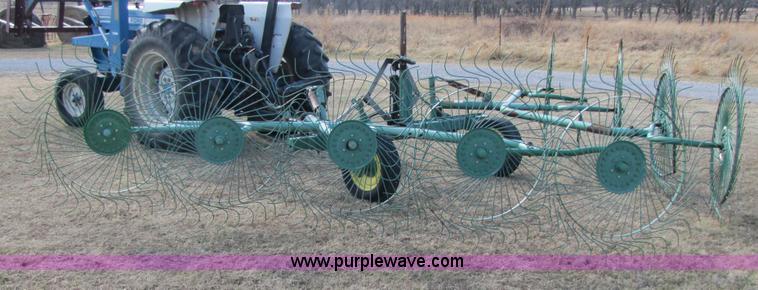 image for item 3515 John Deere 702 10 wheel rake