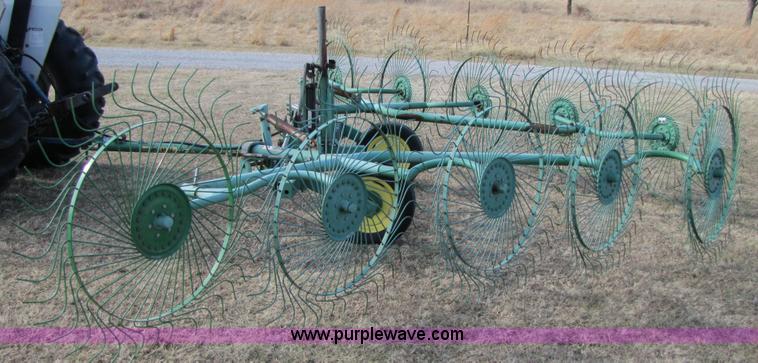 image for item 3515 John Deere 702 10 wheel rake