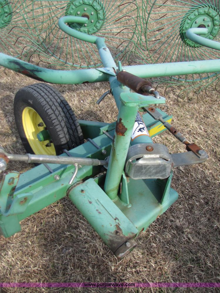 image for item 3515 John Deere 702 10 wheel rake