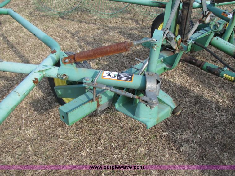 image for item 3515 John Deere 702 10 wheel rake