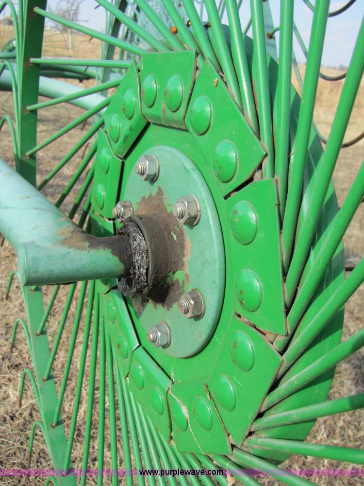 image for item 3515 John Deere 702 10 wheel rake