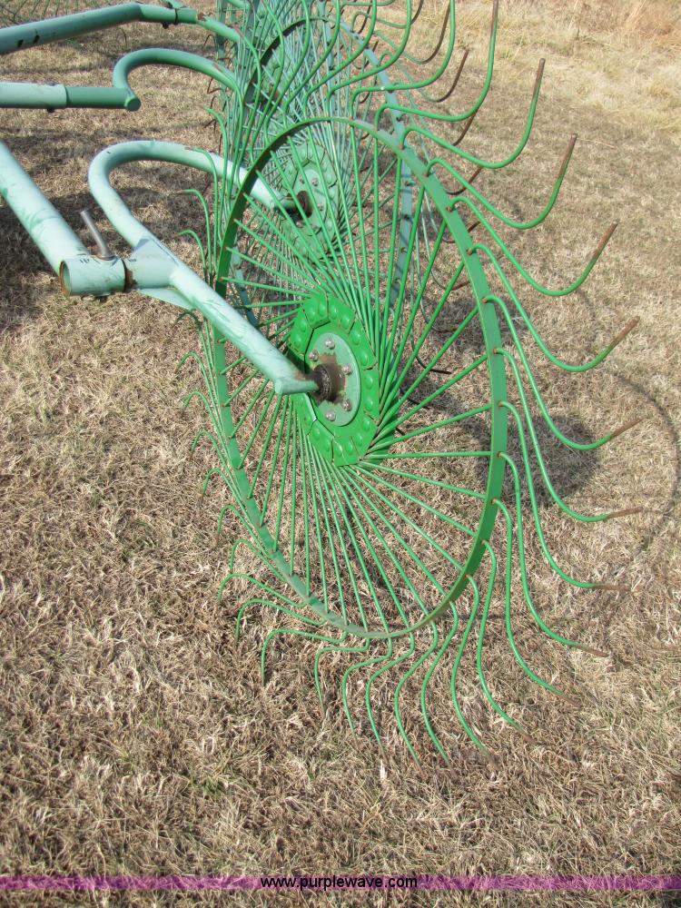 image for item 3515 John Deere 702 10 wheel rake
