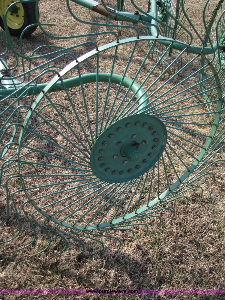 image for item 3515 John Deere 702 10 wheel rake