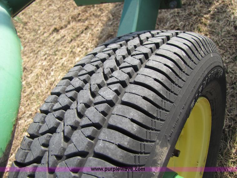 image for item 3515 John Deere 702 10 wheel rake
