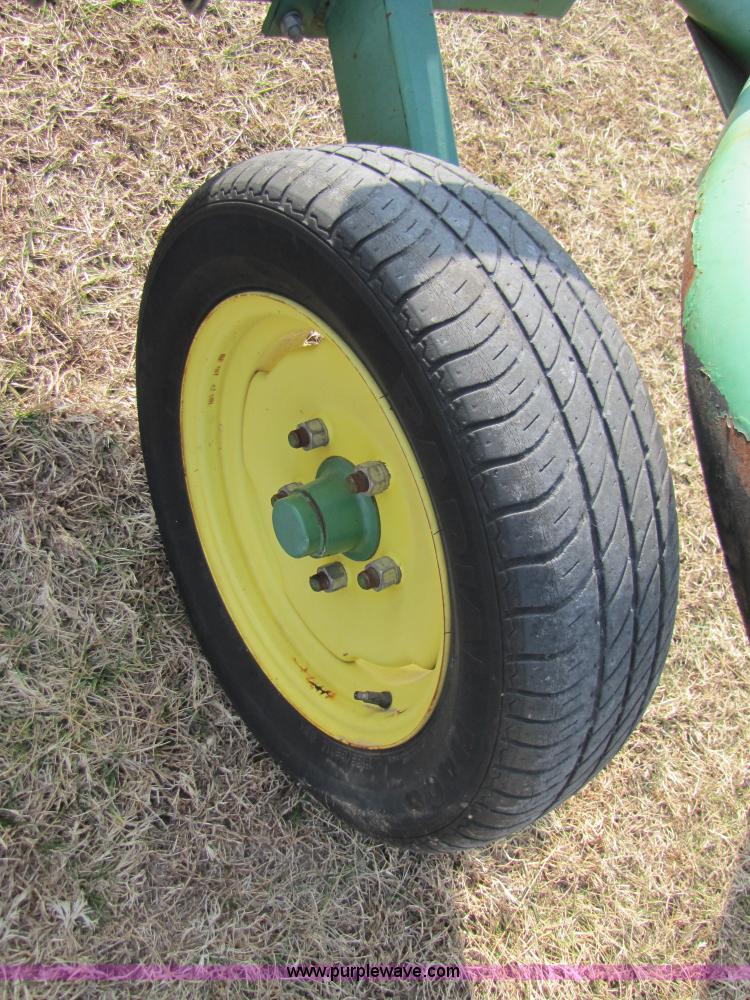 image for item 3515 John Deere 702 10 wheel rake