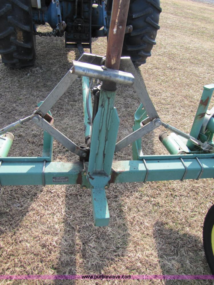 image for item 3515 John Deere 702 10 wheel rake