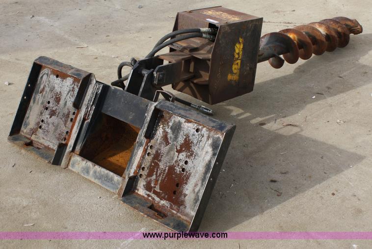 image for item 4959 Lowe 1200 hydraulic post hole digger skid steer attachment