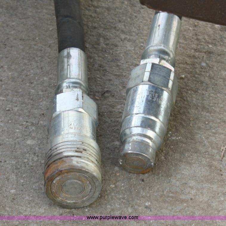 image for item 4959 Lowe 1200 hydraulic post hole digger skid steer attachment