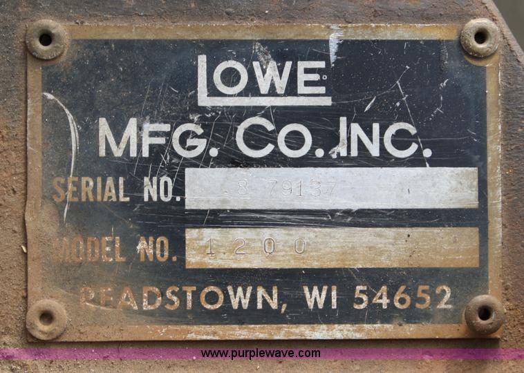 image for item 4959 Lowe 1200 hydraulic post hole digger skid steer attachment