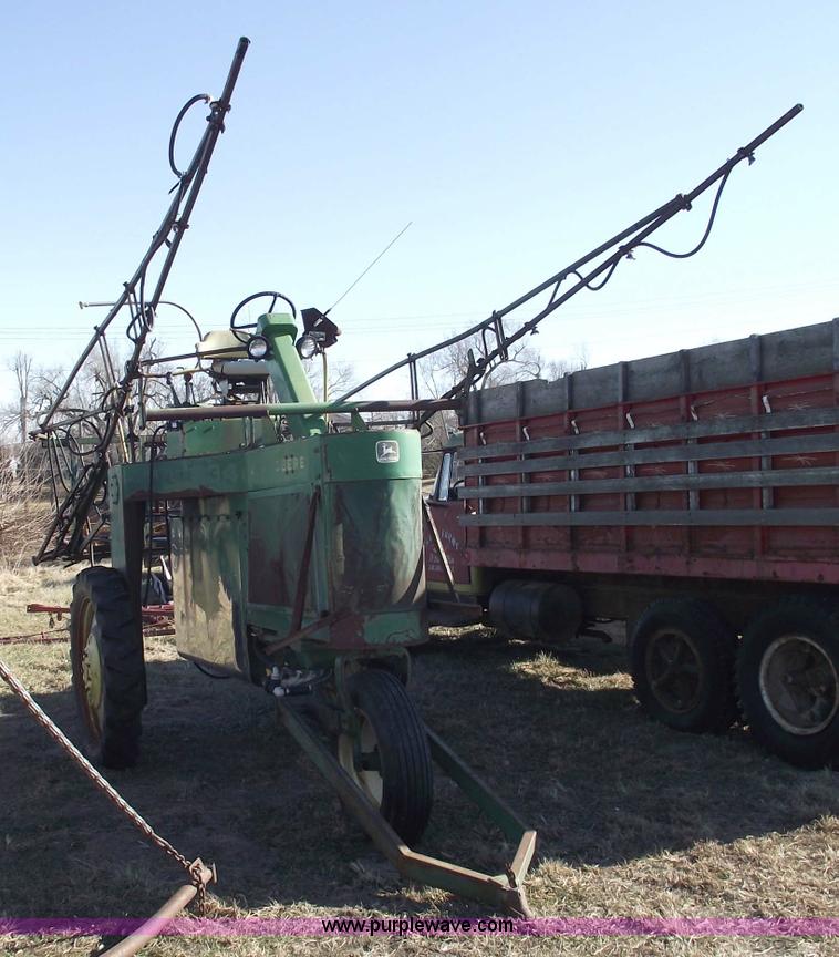 image for item 5512 John Deere 734 high cycle sprayer