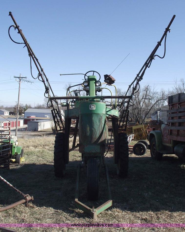 image for item 5512 John Deere 734 high cycle sprayer
