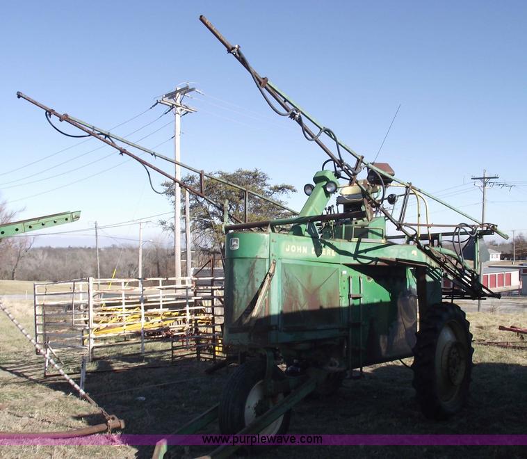 image for item 5512 John Deere 734 high cycle sprayer