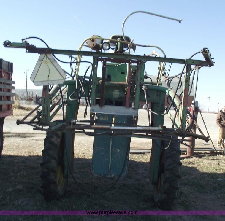image for item 5512 John Deere 734 high cycle sprayer