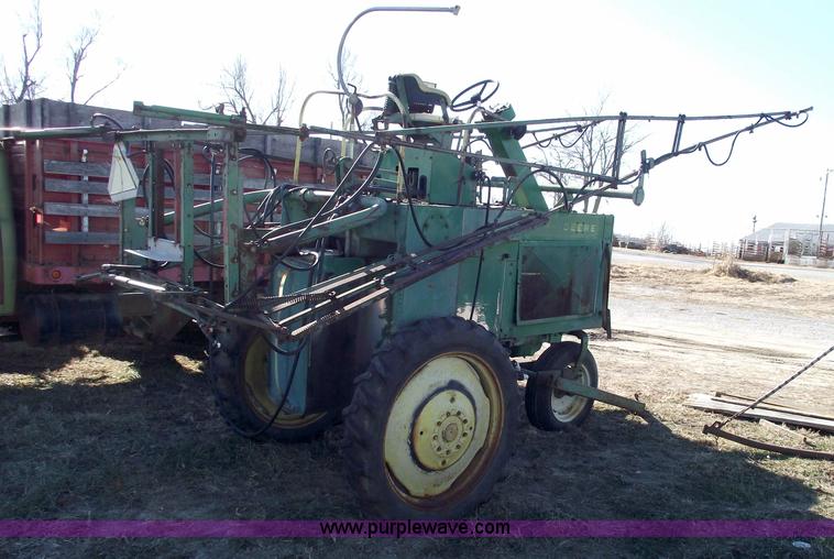 image for item 5512 John Deere 734 high cycle sprayer