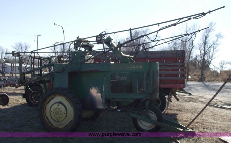 image for item 5512 John Deere 734 high cycle sprayer