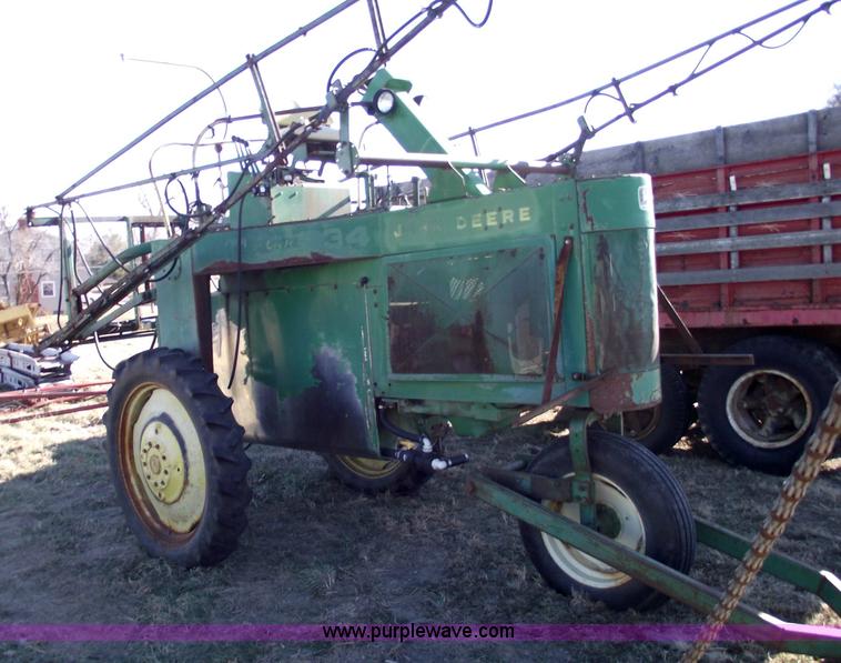 image for item 5512 John Deere 734 high cycle sprayer