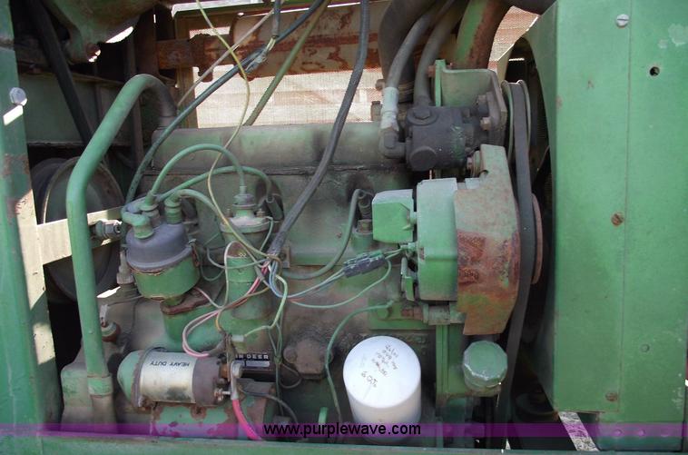 image for item 5512 John Deere 734 high cycle sprayer