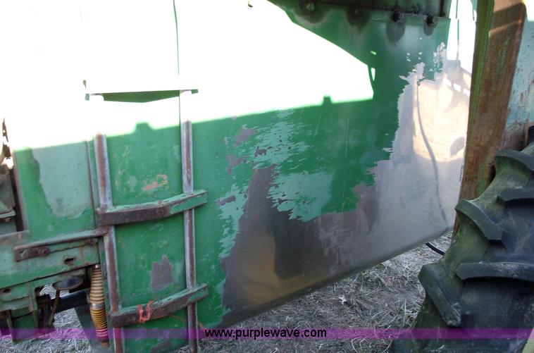 image for item 5512 John Deere 734 high cycle sprayer