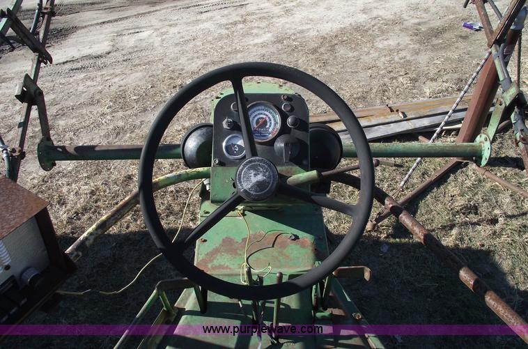 image for item 5512 John Deere 734 high cycle sprayer