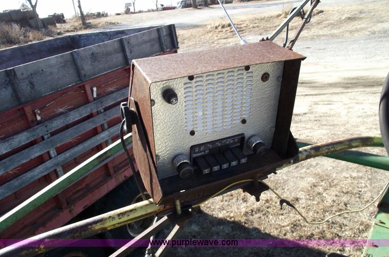 image for item 5512 John Deere 734 high cycle sprayer