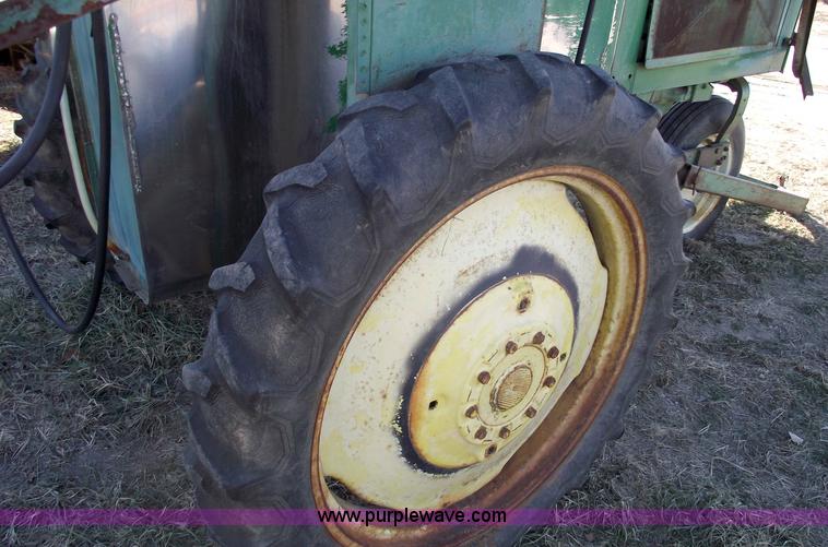 image for item 5512 John Deere 734 high cycle sprayer