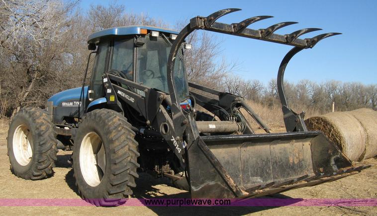 image for item 8105 1999 New Holland TV140 bi-directional tractor
