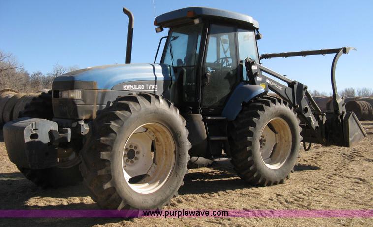 image for item 8105 1999 New Holland TV140 bi-directional tractor
