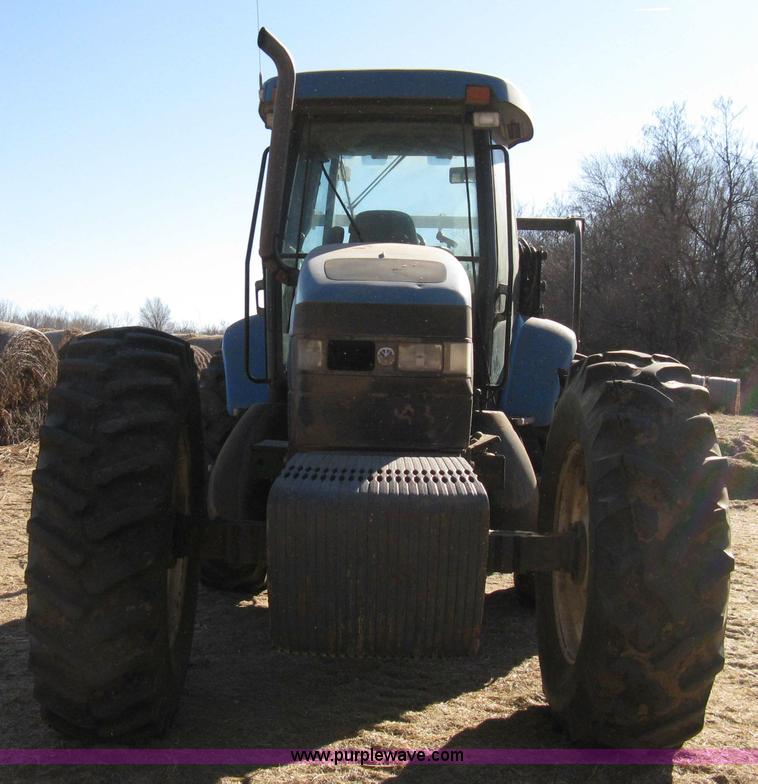 image for item 8105 1999 New Holland TV140 bi-directional tractor