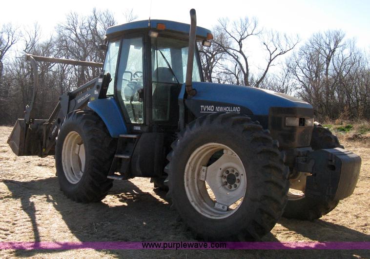 image for item 8105 1999 New Holland TV140 bi-directional tractor