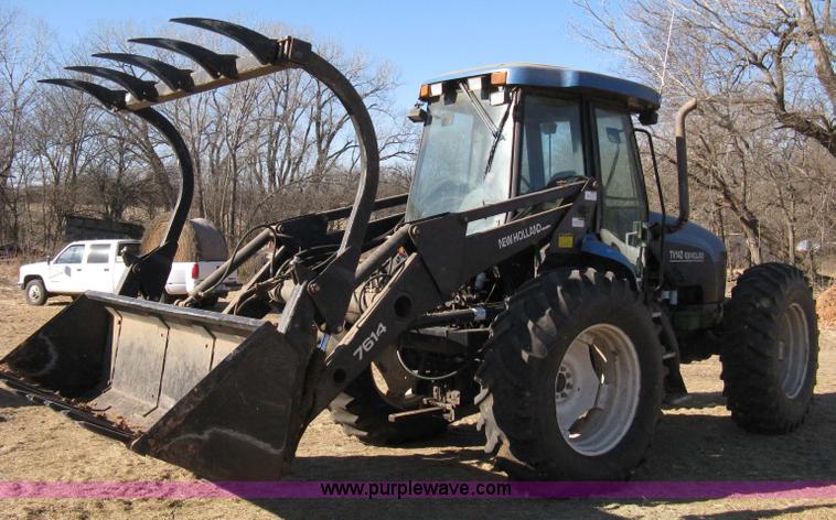 image for item 8105 1999 New Holland TV140 bi-directional tractor
