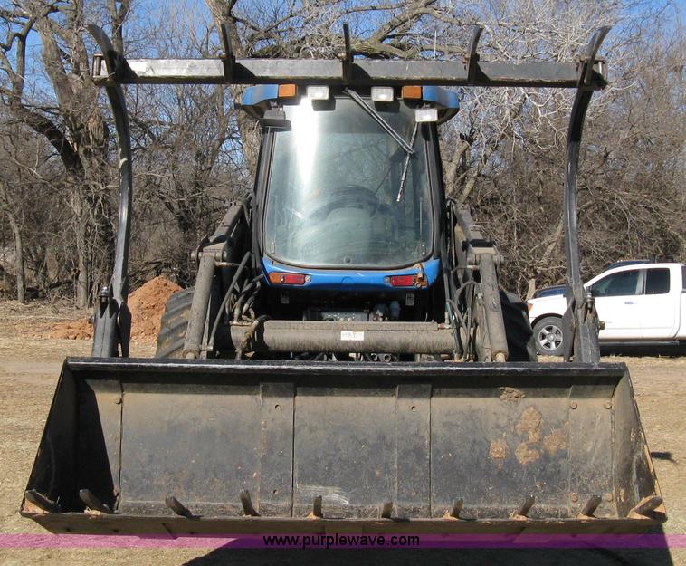 image for item 8105 1999 New Holland TV140 bi-directional tractor