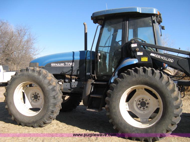 image for item 8105 1999 New Holland TV140 bi-directional tractor