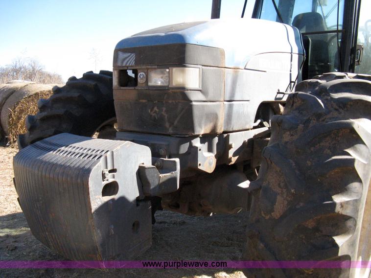 image for item 8105 1999 New Holland TV140 bi-directional tractor