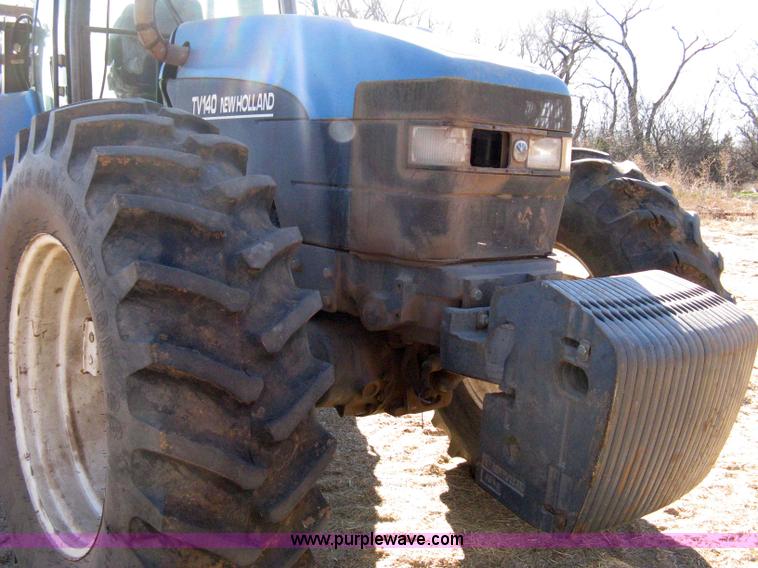 image for item 8105 1999 New Holland TV140 bi-directional tractor