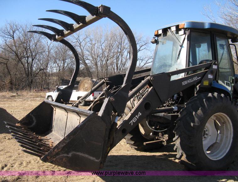 image for item 8105 1999 New Holland TV140 bi-directional tractor