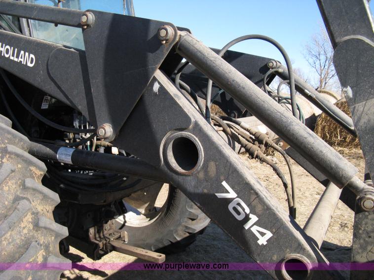 image for item 8105 1999 New Holland TV140 bi-directional tractor