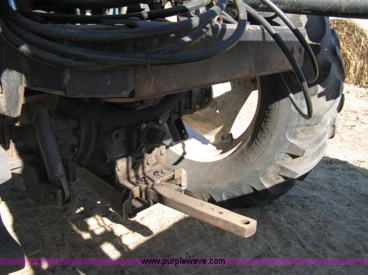 image for item 8105 1999 New Holland TV140 bi-directional tractor