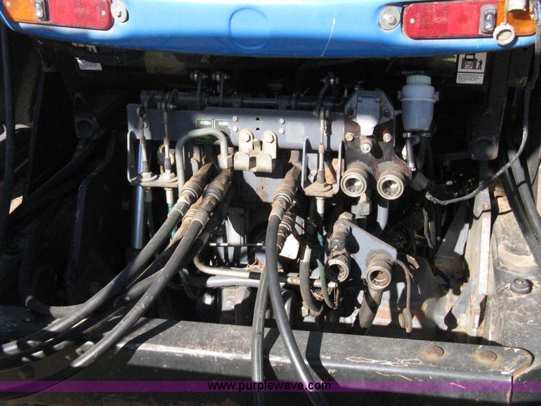 image for item 8105 1999 New Holland TV140 bi-directional tractor