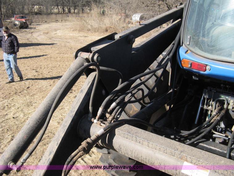 image for item 8105 1999 New Holland TV140 bi-directional tractor