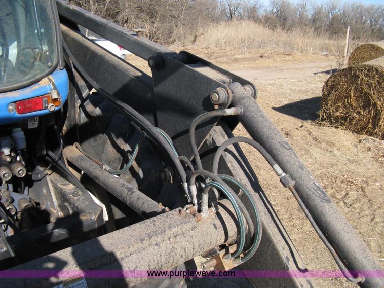 image for item 8105 1999 New Holland TV140 bi-directional tractor