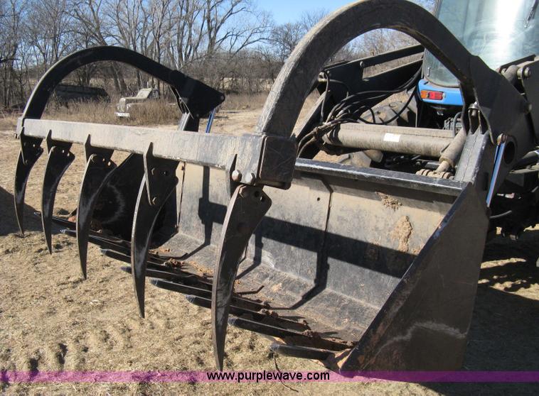 image for item 8105 1999 New Holland TV140 bi-directional tractor