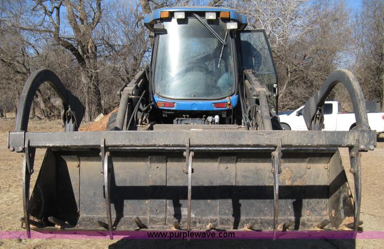 image for item 8105 1999 New Holland TV140 bi-directional tractor