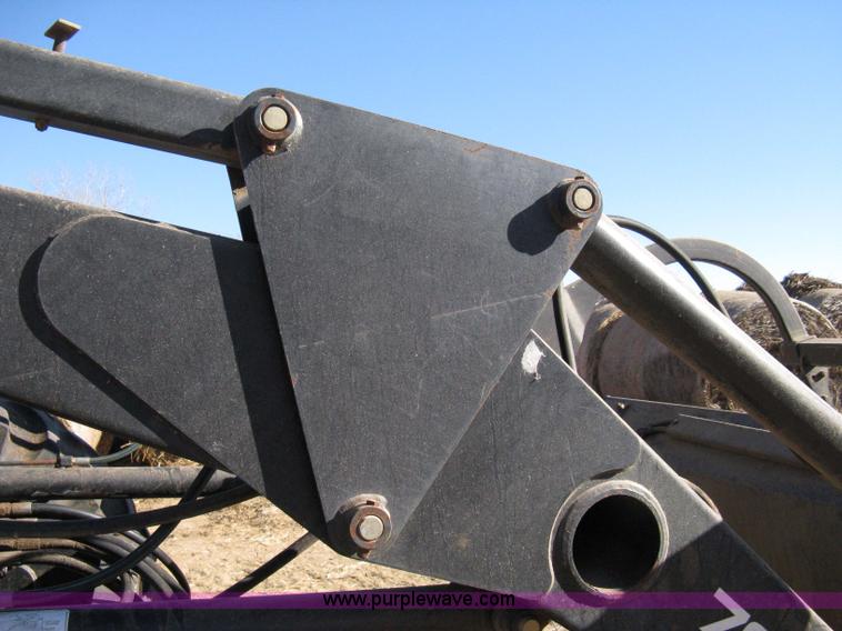 image for item 8105 1999 New Holland TV140 bi-directional tractor