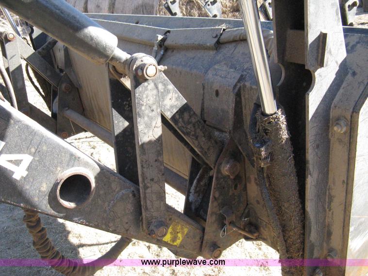 image for item 8105 1999 New Holland TV140 bi-directional tractor